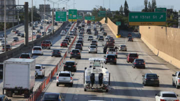 MIAMI, FLORIDA - MAY 27: Vehicles head north along Interstate 95 on May 27, 2021 in Miami, Florida. As COVID-19 restrictions relax, AAA Travel reports that more people are expected to be driving on the highways throughout Memorial Day weekend. (Photo by Joe Raedle/Getty Images)