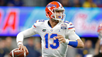 ATLANTA, GEORGIA - DECEMBER 29: Feleipe Franks #13 of the Florida Gators looks to pass against the Michigan Wolverines in the first quarter during the Chick-fil-A Peach Bowl at Mercedes-Benz Stadium on December 29, 2018 in Atlanta, Georgia. (Photo by Mike Zarrilli/Getty Images)