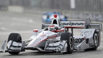 Jun 5, 2016; Detroit, MI, USA; Team Penske driver Will Power (12) of Great Britain rounds turn one during the qualifying session for the Chevrolet Dual in Detroit Race 2 at The Raceway at Belle Isle Park. Mandatory Credit: Raj Mehta-USA TODAY Sports