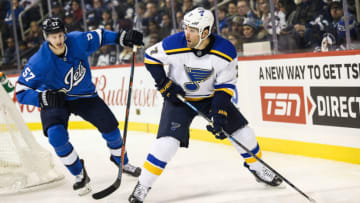 WINNIPEG, MB December 07: St. Louis Blues forward Patrick Maroon (7) looks to make a pass during the regular season game between the Winnipeg Jets and the St. Louis Blues on December 07, 2018, at the Bell MTS Place in Winnipeg, MB. (Photo by Terrence Lee/Icon Sportswire via Getty Images)
