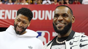 LAS VEGAS, NEVADA - JULY 06: Anthony Davis (L) and LeBron James of the Los Angeles Lakers arrive at a game between the Lakers and the LA Clippers during the 2019 NBA Summer League at the Thomas & Mack Center on July 6, 2019 in Las Vegas, Nevada. NOTE TO USER: User expressly acknowledges and agrees that, by downloading and or using this photograph, User is consenting to the terms and conditions of the Getty Images License Agreement. (Photo by Ethan Miller/Getty Images)