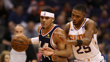 PHOENIX, ARIZONA - DECEMBER 10: Tobias Harris #34 of the LA Clippers drives the ball past Mikal Bridges #25 of the Phoenix Suns during the first half of the NBA game at Talking Stick Resort Arena on December 10, 2018 in Phoenix, Arizona. NOTE TO USER: User expressly acknowledges and agrees that, by downloading and or using this photograph, User is consenting to the terms and conditions of the Getty Images License Agreement. (Photo by Christian Petersen/Getty Images)