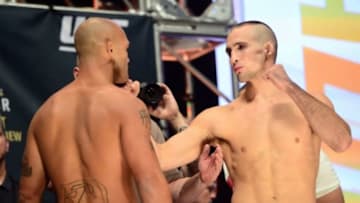 Jul 10, 2015; Las Vegas, NV, USA; Robbie Lawler (left) and Rory MacDonald (right) face off during weigh-ins for UFC 189 at MGM Grand Garden Arena. Mandatory Credit: Joe Camporeale-USA TODAY Sports
