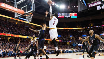 CLEVELAND, OH - JANUARY 19: Kyrie Irving #2 of the Cleveland Cavaliers shoots over Tyson Chandler #4 of the Phoenix Suns during the first half at Quicken Loans Arena on January 19, 2017 in Cleveland, Ohio. NOTE TO USER: User expressly acknowledges and agrees that, by downloading and/or using this photograph, user is consenting to the terms and conditions of the Getty Images License Agreement. Mandatory copyright notice. (Photo by Jason Miller/Getty Images)