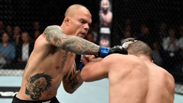 HAMBURG, GERMANY - JULY 22: (L-R) Anthony Smith punches Mauricio Rua of Brazil in their light heavyweight bout during the UFC Fight Night at Barclaycard Arena on July 22, 2018 in Hamburg, Germany. (Photo by Jeff Bottari/Zuffa LLC/Zuffa LLC via Getty Images)