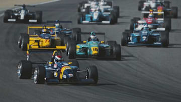 Dan Wheldon of Great Britain driver of the #3 PPI Motorsports Swift 011c Toyota leads the field during the Championship Auto Racing Teams (CART) Toyota Formula Atlantic Championship Series Grand Prix of Monterey on 9 September 2000 at the Laguna Seca Raceway, Monterey, California, United States. (Photo by Jon Ferrey/Getty Images)