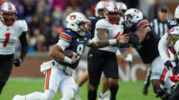 Auburn football quarterback Robby Ashford (9) runs the ball as Auburn Tigers take on Western Kentucky Hilltoppers at Jordan-Hare Stadium in Auburn, Ala., on Saturday, Nov. 19, 2022. Auburn Tigers and Western Kentucky Hilltoppers are tied 17-17 at halftime.