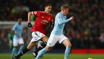 MANCHESTER, ENGLAND - DECEMBER 10: Kevin De Bruyne of Manchester City is tracked by Nemanja Matic of Manchester United during the Premier League match between Manchester United and Manchester City at Old Trafford on December 10, 2017 in Manchester, England. (Photo by Michael Steele/Getty Images)