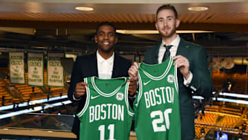 BOSTON, MA - SEPTEMBER 1: Kyrie Irving and Gordon Hayward pose for a picture holding their jerseys before their introduction as Boston Celtics on September 1, 2017 at the TD Garden in Boston, Massachusetts. NOTE TO USER: User expressly acknowledges and agrees that, by downloading and or using this photograph, User is consenting to the terms and conditions of the Getty Images License Agreement. Mandatory Copyright Notice: Copyright 2017 NBAE (Photo by Brian Babineau/NBAE via Getty Images)