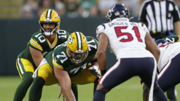 Aug 14, 2021; Green Bay, Wisconsin, USA; Green Bay Packers quarterback Jordan Love (10) takes a snap from center Josh Myers (71) against the Houston Texans during a preseason game at Lambeau Field. Mandatory Credit: Dan Powers/USA TODAY NETWORK-Wisconsin via USA TODAY NETWORK