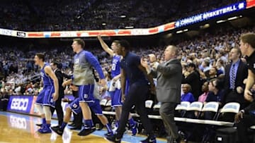 Mar 7, 2015; Chapel Hill, NC, USA; Duke Blue Devils bench reacts in the second half. The Blue Devils defeated the Tar Heels 84-77 at Dean E. Smith Center. Mandatory Credit: Bob Donnan-USA TODAY Sports