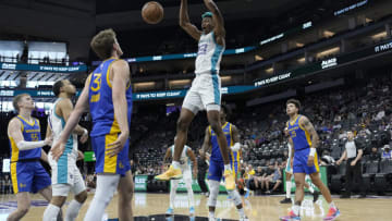 SACRAMENTO, CALIFORNIA - JULY 05: Kai Jones #23 of the Charlotte Hornets slam dunks against the Golden State Warriors in the first half during the 2023 NBA California Classic at Golden 1 Center on July 05, 2023 in Sacramento, California. NOTE TO USER: User expressly acknowledges and agrees that, by downloading and or using this photograph, User is consenting to the terms and conditions of the Getty Images License Agreement. (Photo by Thearon W. Henderson/Getty Images)