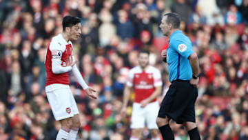 LONDON, ENGLAND - DECEMBER 22: Mesut Ozil of Arsenal appeals to referee Martin Atkinson during the Premier League match between Arsenal FC and Burnley FC at Emirates Stadium on December 22, 2018 in London, United Kingdom. (Photo by Julian Finney/Getty Images)