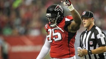 Jan 13, 2013; Atlanta, GA, USA; Atlanta Falcons defensive tackle Jonathan Babineaux (95) celebrates a fumble recovery in the first quarter of the NFC divisional playoff game against the Seattle Seahawks at the Georgia Dome. Mandatory Credit: Daniel Shirey-USA TODAY Sports