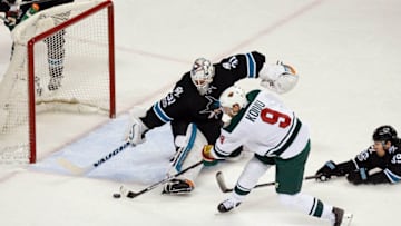 Jan 5, 2017; San Jose, CA, USA; Minnesota Wild center Mikko Koivu (9) shoots the puck against San Jose Sharks goalie Martin Jones (31) during the third period of the game at SAP Center at San Jose. The Minnesota Wild defeated the San Jose Sharks with a score of 5-4. Mandatory Credit: Stan Szeto-USA TODAY Sports