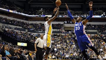 Nov 9, 2016; Indianapolis, IN, USA; Indiana Pacers forward Paul George (13) takes a shot against Philadelphia 76ers forward Robert Covington (33) at Bankers Life Fieldhouse. Indiana defeats Philadelphia in overtime 122-115. Mandatory Credit: Brian Spurlock-USA TODAY Sports