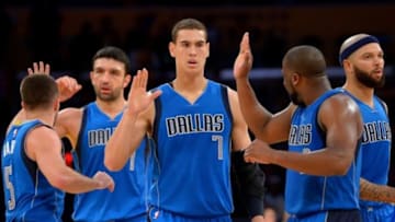 Nov 1, 2015; Los Angeles, CA, USA; Dallas Mavericks guard J.J. Barea (5), center Zaza Pachulia (27), forward Dwight Powell (7), guard Raymond Felton (2) and guard Deron Williams (8) head to the bench in the second half of the game against the Los Angeles Lakers at Staples Center. Mandatory Credit: Jayne Kamin-Oncea-USA TODAY Sports