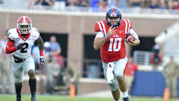 Sep 24, 2016; Oxford, MS, USA; Mississippi Rebels quarterback Chad Kelly (10) runs the ball during a play that would result in a touchdown during the third quarter of the game against the Georgia Bulldogs at Vaught-Hemingway Stadium. Mississippi won 45-14. Mandatory Credit: Matt Bush-USA TODAY Sports