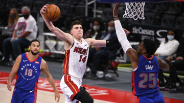 Miami Heat guard Tyler Herro (14) goes up for a slam dunk as Detroit Pistons forward Tyler Cook (25) attempts to defend(Tim Fuller-USA TODAY Sports)