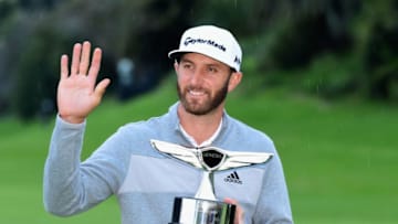 PACIFIC PALISADES, CA - FEBRUARY 19: Dustin Johnson poses with the trophy during the final round at the Genesis Open at Riviera Country Club on February 19, 2017 in Pacific Palisades, California. (Photo by Harry How/Getty Images)