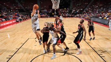 LAS VEGAS, NV - JULY 11: Kyle Collinsworth #30 of Dallas Mavericks goes for the lay up during the game against the Toronto Raptors during the 2016 Las Vegas Summer League on July 11, 2016 atthe Thomas & Mack Center in Las Vegas, Nevada. NOTE TO USER: User expressly acknowledges and agrees that, by downloading and or using this Photograph, user is consenting to the terms and conditions of the Getty Images License Agreement. Mandatory Copyright Notice: Copyright 2016 NBAE (Photo by Garrett Ellwood/NBAE via Getty Images)