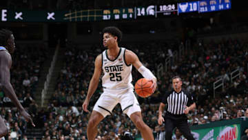 EAST LANSING, MI - DECEMBER 30: Malik Hall #25 of the Michigan State Spartans handles the ball during the first half against the Buffalo Bulls at Breslin Center on December 30, 2022 in East Lansing, Michigan. (Photo by Rey Del Rio/Getty Images)