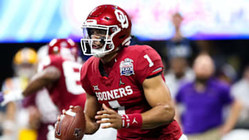 ATLANTA, GA - DECEMBER 28: Jalen Hurts #1 of the Oklahoma Sooners scrambles with the ball during the Chick-fil-A Peach Bowl against the LSU Tigers at Mercedes-Benz Stadium on December 28, 2019 in Atlanta, Georgia. (Photo by Carmen Mandato/Getty Images)