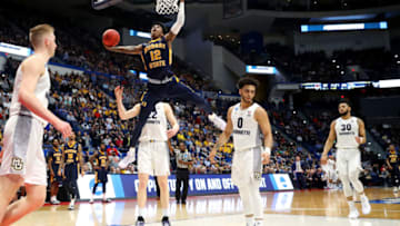 HARTFORD, CONNECTICUT - MARCH 21: Ja Morant #12 of the Murray State Racers dunks the ball during the second half of the first round game of the 2019 NCAA Men's Basketball Tournament against the Marquette Golden Eagles at XL Center on March 21, 2019 in Hartford, Connecticut. Murray State defeated Marquette 83-64. (Photo by Maddie Meyer/Getty Images)