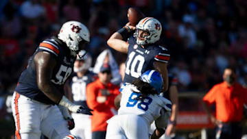 Auburn football quarterback Bo Nix (10) passes under pressure against the Georgia State Panthers at Jordan-Hare Stadium in Auburn, Ala., on Saturday, Sept. 25, 2021.Auburn19