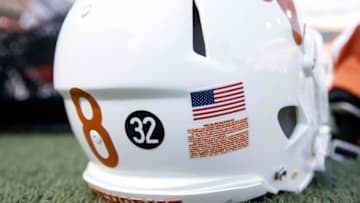AUSTIN, TX - AUGUST 31: A Texas Longhorns helmet is seen with a number 32 decal honoring the passing of former running back Cedric Benson during the game against the Louisiana Tech Bulldogs at Darrell K Royal-Texas Memorial Stadium on August 31, 2019 in Austin, Texas. (Photo by Tim Warner/Getty Images)