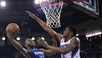 Mar 20, 2015; Sacramento, CA, USA; Sacramento Kings forward Rudy Gay (8) defends the shot by Charlotte Hornets guard Kemba Walker (15) during the second quarter at Sleep Train Arena. Mandatory Credit: Kelley L Cox-USA TODAY Sports