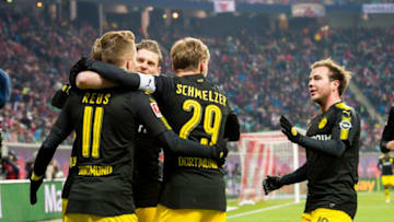 LEIPZIG, GERMANY - MARCH 03: Marco Reus of Borussia Dortmund celebrates after scoring a goal to make it 1:1 together with his team mates during the Bundesliga match between RB Leipzig and Borussia Dortmund at the Red Bull Arena on March 03, 2018 in Leipzig, Germany. (Photo by Alexandre Simoes/Borussia Dortmund/Getty Images)