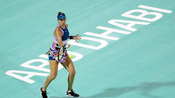 ABU DHABI, UNITED ARAB EMIRATES - FEBRUARY 08: Belinda Bencic of Switzerland plays a forehand against Marta Kostyuk of Ukraine during her Women's Singles match on Day 3 of the Mubadala Abu Dhabi Open, part of the Hologic WTA Tour, at Zayed Sports City on February 08, 2023 in Abu Dhabi, United Arab Emirates. (Photo by Christopher Pike/Getty Images)ˆ