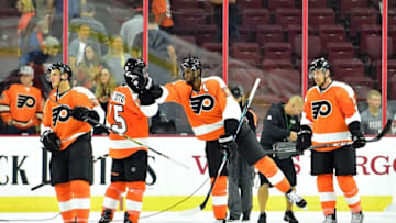 Sep 27, 2016; Philadelphia, PA, USA; Philadelphia Flyers right wing Wayne Simmonds (17) celebrates with defenseman Michael Del Zotto (15) after own against the New York Islanders during the third period during a preseason hockey game at Wells Fargo Center. The Flyers defeated the Islanders, 4-0. Mandatory Credit: Eric Hartline-USA TODAY Sports