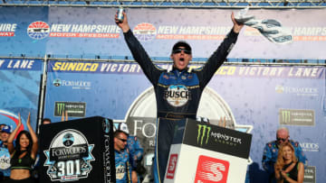 LOUDON, NEW HAMPSHIRE - JULY 21: Kevin Harvick, driver of the #4 Busch Beer/National Forest Foundation Ford, celebrates in Victory Lane after winning the Monster Energy NASCAR Cup Series Foxwoods Resort Casino 301 at New Hampshire Motor Speedway on July 21, 2019 in Loudon, New Hampshire. (Photo by Brian Lawdermilk/Getty Images)