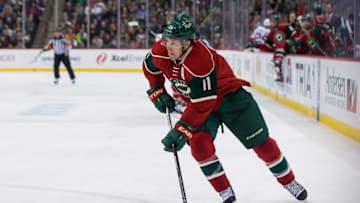Mar 31, 2016; Saint Paul, MN, USA; Minnesota Wild forward Zach Parise (11) skates with the puck in the second period against the Ottawa Senators at Xcel Energy Center. the Ottawa Senators beat the Minnesota Wild 3-2. Mandatory Credit: Brad Rempel-USA TODAY Sports