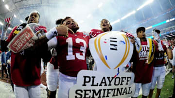 ATLANTA, GA - DECEMBER 31: Players from the Alabama Crimson Tide celebrate after winning 24 to 7 against the Washington Huskies during the 2016 Chick-fil-A Peach Bowl at the Georgia Dome on December 31, 2016 in Atlanta, Georgia. (Photo by Scott Cunningham/Getty Images)