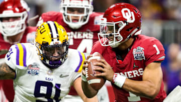 ATLANTA, GA - DECEMBER 28: Jalen Hurts #1 of the Oklahoma Sooners scrambles with the ball during the Chick-fil-A Peach Bowl against the LSU Tigers at Mercedes-Benz Stadium on December 28, 2019 in Atlanta, Georgia. (Photo by Carmen Mandato/Getty Images)