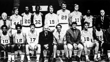 BOSTON - 1974: The 1973-74 NBA Champion Boston Celtics pose for a team portrait at the Boston Garden in Boston, MA. Seated from left, Jo Jo White, Don Chaney, John Havlicek, President and Genereal Manager Arnold (Red) Auerbach, Chairman of the Board Robert Schmertz, Coach Tom Heinsohn, Dave Cowens, Paul Silas and Assistant Coach John Killilea. Standing from left, Assistant Trainer Mark Volk, Team Dentist Dr. Samuel Kane, Paul Westphal, Phil Hankinson, Steve Downing, Don Nelson, Hank Finkel, Steve Kuberski, Art Williams, Team Physician Dr. Thomas Silva and Trainer Frank Challant. NOTE TO USER: User expressly acknowledges and agrees that, by downloading and or using this photograph, User is consenting to the terms and conditions of the Getty Images License Agreement. Mandatory copyright notice: Copyright NBAE 2002 (Photo by NBA Photo Library/ NBAE/ Getty Images)