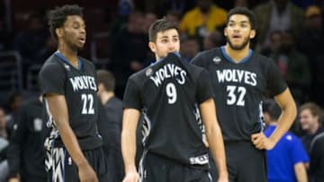 Jan 4, 2016; Philadelphia, PA, USA; Minnesota Timberwolves guard Ricky Rubio (9) and guard Andrew Wiggins (22) and center Karl-Anthony Towns (32) react as time winds down on a loss against the Philadelphia 76ers at Wells Fargo Center. The 76ers won 109-99. Mandatory Credit: Bill Streicher-USA TODAY Sports