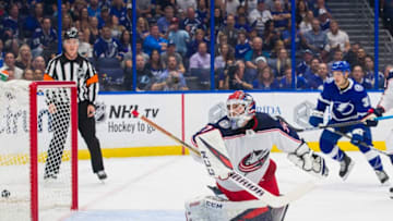 TAMPA, FL - OCTOBER 13: Yanni Gourde #37 of the Tampa Bay Lightning watches the puck fly into the net against goalie Sergei Bobrovsky #72 of the Columbus Blue Jackets during the first period at Amalie Arena on October 13, 2018 in Tampa, Florida. (Photo by Scott Audette/NHLI via Getty Images)