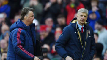 MANCHESTER, ENGLAND - FEBRUARY 28: Arsene Wenger (R), Manager of Arsenal walks back to the dressing rooms with Louis van Gaal, Manager of Manchester United after the Barclays Premier League match between Manchester United and Arsenal at Old Trafford on February 28, 2016 in Manchester, England. (Photo by Shaun Botterill/Getty Images)