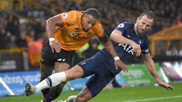 WOLVERHAMPTON, ENGLAND - DECEMBER 15: Adama Traore of Wolverhampton Wanderers battles for possession with Harry Kane of Tottenham Hotspur during the Premier League match between Wolverhampton Wanderers and Tottenham Hotspur at Molineux on December 15, 2019 in Wolverhampton, United Kingdom. (Photo by Michael Regan/Getty Images)