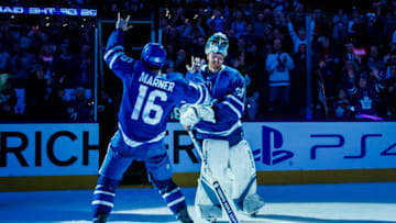 TORONTO, ON - NOVEMBER 19: Mitch Marner #16 of the Toronto Maple Leafs salutes the crowd as teammate Frederik Andersen #31 comes out to receive his start of the game after defeating the Columbus Blue Jackets at the Scotiabank Arena on November 19, 2018 in Toronto, Ontario, Canada. (Photo by Mark Blinch/NHLI via Getty Images)