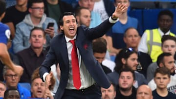 Arsenal's Spanish head coach Unai Emery gestures on the touchline during the English Premier League football match between Chelsea and Arsenal at Stamford Bridge in London on August 18, 2018. - Chelsea won the game 3-2. (Photo by Glyn KIRK / AFP) / RESTRICTED TO EDITORIAL USE. No use with unauthorized audio, video, data, fixture lists, club/league logos or 'live' services. Online in-match use limited to 120 images. An additional 40 images may be used in extra time. No video emulation. Social media in-match use limited to 120 images. An additional 40 images may be used in extra time. No use in betting publications, games or single club/league/player publications. / (Photo credit should read GLYN KIRK/AFP/Getty Images)