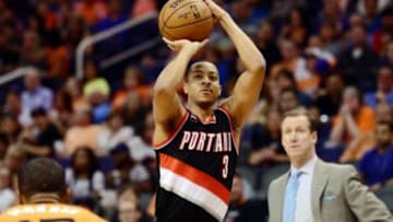 Mar 27, 2015; Phoenix, AZ, USA; Portland Trail Blazers guard C.J. McCollum (3) shoots the ball against the Phoenix Suns during the first half at US Airways Center. Mandatory Credit: Joe Camporeale-USA TODAY Sports