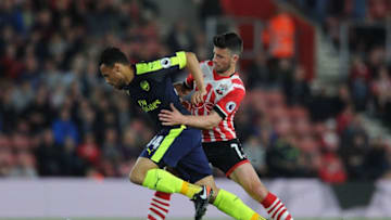 SOUTHAMPTON, ENGLAND - MAY 10: Francis Coquelin of Arsenal is challenged by Shane Long of Southampton during the Premier League match between Southampton and Arsenal at St Mary's Stadium on May 10, 2017 in Southampton, England. (Photo by David Price/Arsenal FC via Getty Images)