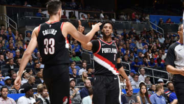 ORLANDO, FL - OCTOBER 25: Evan Turner #1 high fives Zach Collins #33 of the Portland Trail Blazers during the game against the Orlando Magic on October 25, 2018 at Amway Center in Orlando, Florida. NOTE TO USER: User expressly acknowledges and agrees that, by downloading and/or using this photograph, user is consenting to the terms and conditions of the Getty Images License Agreement. Mandatory Copyright Notice: Copyright 2018 NBAE (Photo by Fernando Medina/NBAE via Getty Images)