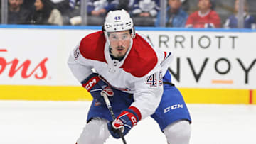 TORONTO, CANADA - APRIL 8: Rafael Harvey-Pinard #49 of the Montreal Canadiens skates with the puck against the Toronto Maple Leafs during an NHL game at Scotiabank Arena on April 8, 2023 in Toronto, Ontario, Canada. The Maple Leafs defeated the Canadiens 7-1.(Photo by Claus Andersen/Getty Images)