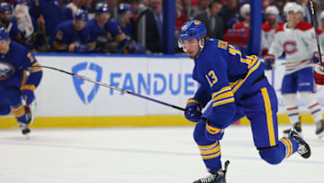 Mar 27, 2023; Buffalo, New York, USA; Buffalo Sabres right wing Lukas Rousek (13) skates for a loose puck during the second period against the Montreal Canadiens at KeyBank Center. Mandatory Credit: Timothy T. Ludwig-USA TODAY Sports